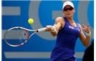 BIRMINGHAM, ENGLAND - JUNE 11: Samantha Stosur of Australia in action against Christina McHale of the USA during day three of the Aegon Classic at the Edgbaston Priory Club on June 11, 2014 in Birmingham, England. (Photo by Paul Thomas/Getty Images)